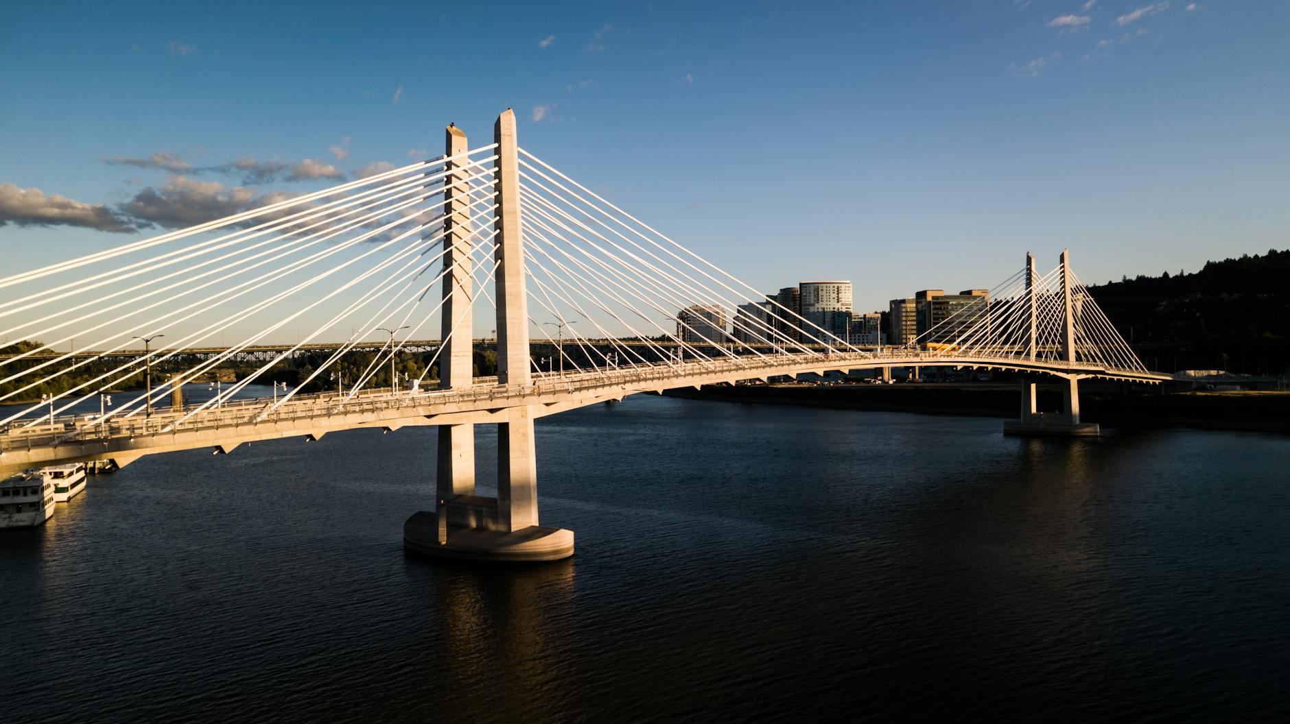 Scenic view of Tilikum Crossing over the Willamette River in Portland, Oregon at sunset.